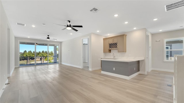 unfurnished living room featuring recessed lighting, visible vents, and light wood-style floors