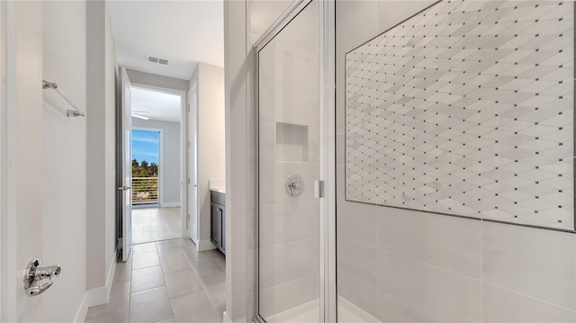 full bath with visible vents, a stall shower, and tile patterned flooring