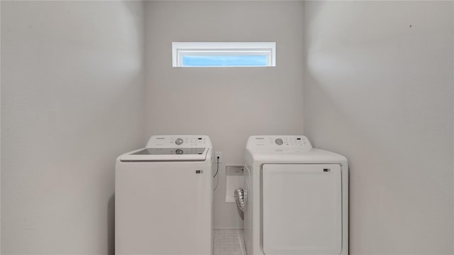 laundry area featuring washing machine and dryer and laundry area