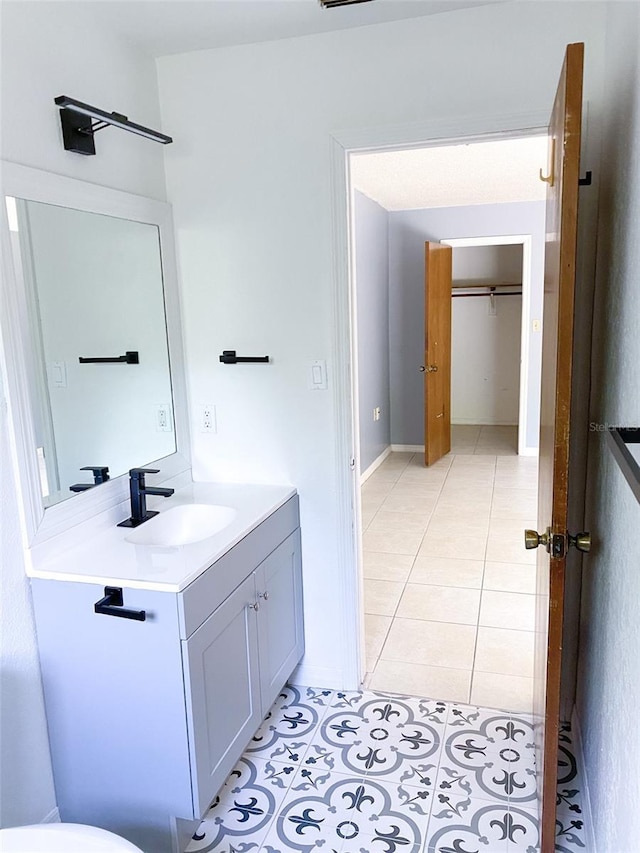 bathroom featuring vanity and tile patterned floors