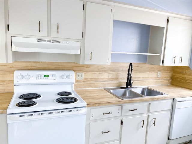 kitchen with under cabinet range hood, white appliances, a sink, white cabinetry, and decorative backsplash