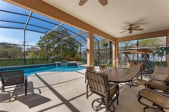 exterior space with a swimming pool and a ceiling fan