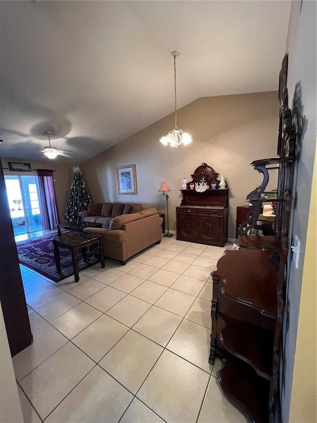 3449 Village Green Ct, Saint Cloud, FL 34772 - living area with light tile patterned floors, lofted ceiling, and a notable chandelier