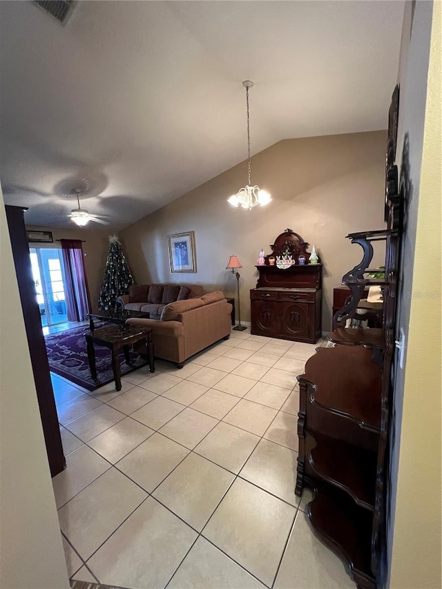 3449 Village Green Ct, Saint Cloud, FL 34772 - living area featuring visible vents, vaulted ceiling, a notable chandelier, and light tile patterned flooring