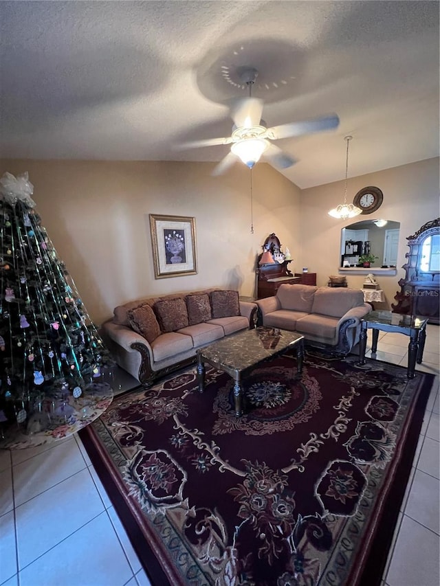3449 Village Green Ct, Saint Cloud, FL 34772 - living area featuring a ceiling fan, a textured ceiling, and tile patterned floors