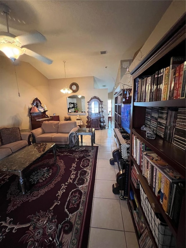 3449 Village Green Ct, Saint Cloud, FL 34772 - tiled living area featuring ceiling fan with notable chandelier