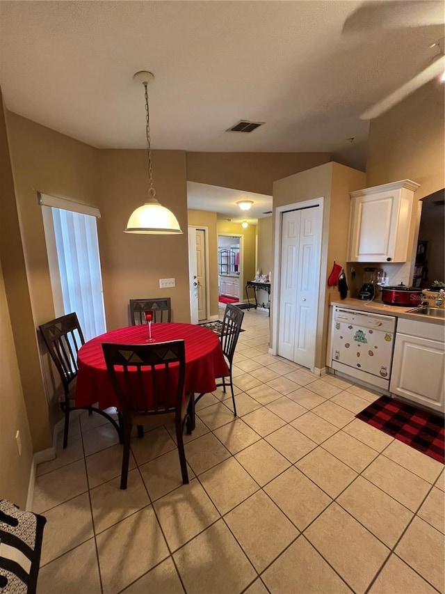 3449 Village Green Ct, Saint Cloud, FL 34772 - dining area with light tile patterned floors, visible vents, and a textured ceiling