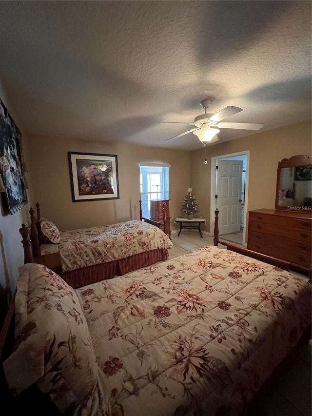 3449 Village Green Ct, Saint Cloud, FL 34772 - bedroom with a textured ceiling and ceiling fan