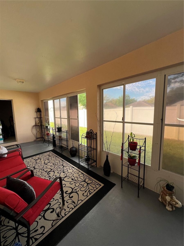 3449 Village Green Ct, Saint Cloud, FL 34772 - living area with a wealth of natural light and concrete flooring