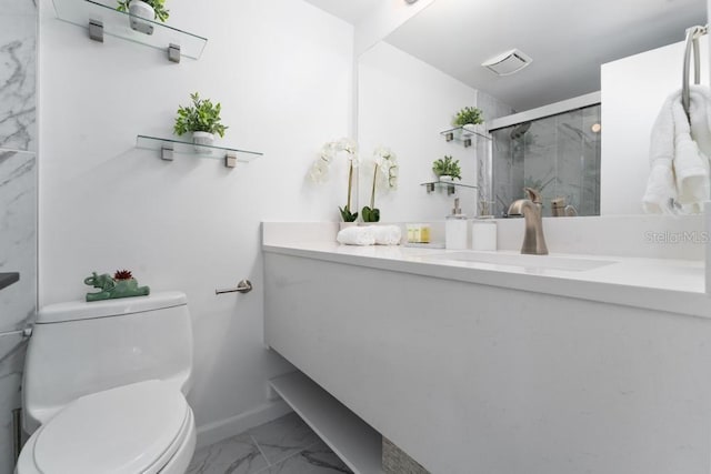 bathroom featuring toilet, vanity, baseboards, marble finish floor, and a stall shower