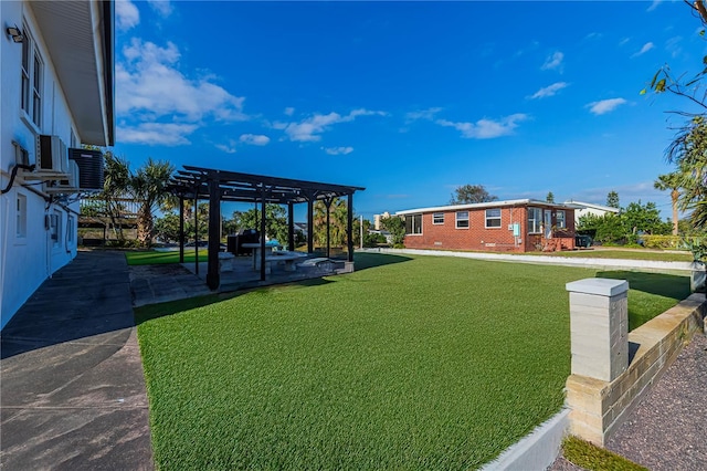 view of yard with a pergola