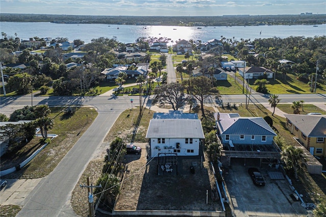 bird's eye view featuring a residential view and a water view