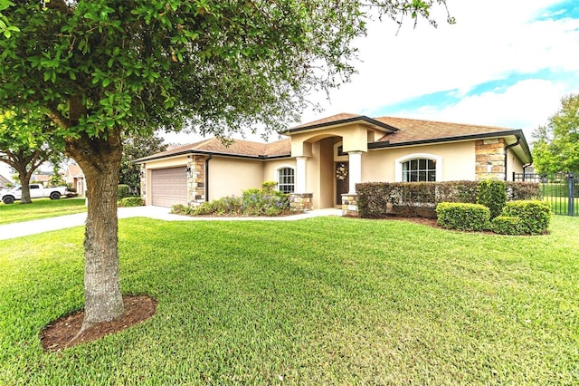 view of front of house featuring an attached garage, stucco siding, a front lawn, concrete driveway, and stone siding