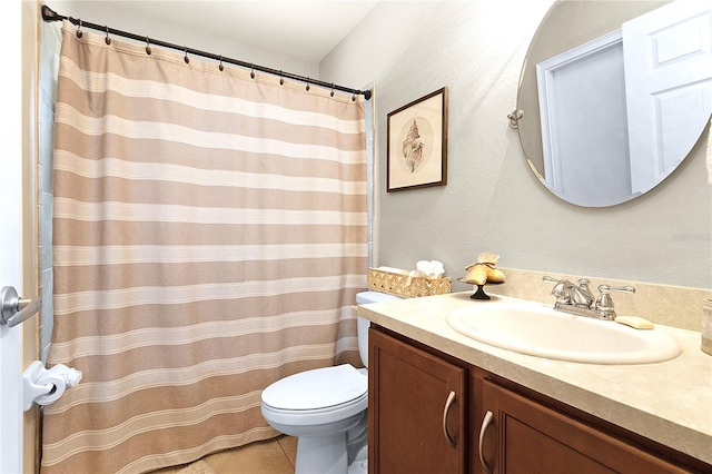 full bath featuring tile patterned floors, curtained shower, toilet, and vanity