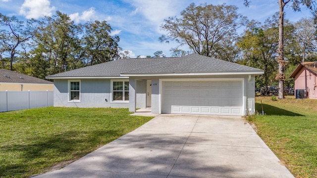 ranch-style home with a garage, concrete driveway, fence, a front lawn, and stucco siding