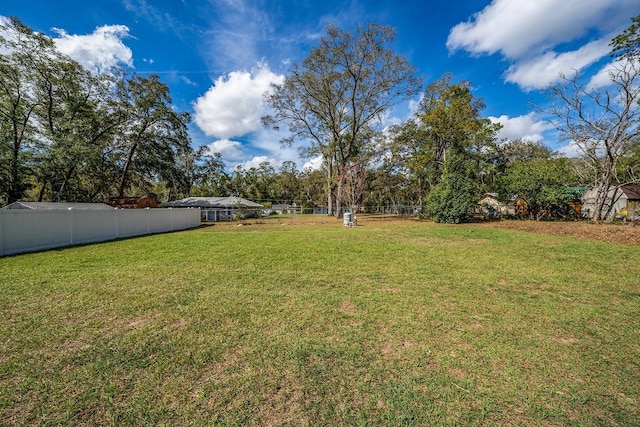 view of yard with fence