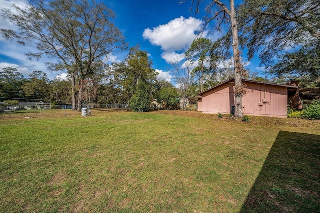 view of yard featuring fence