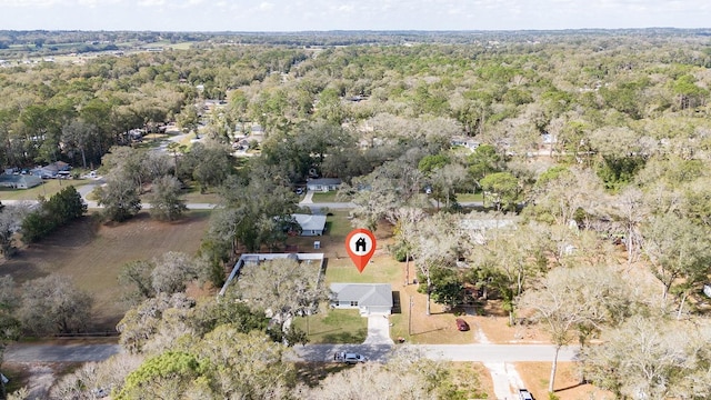 drone / aerial view with a view of trees