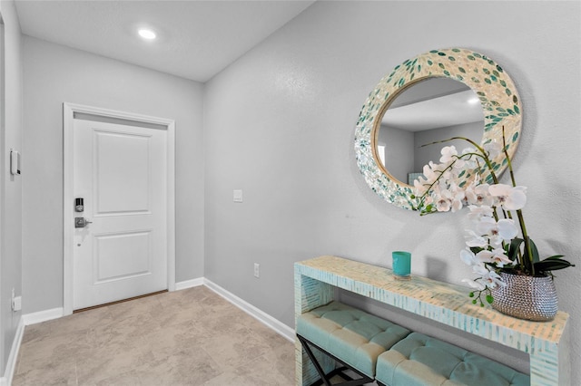 entrance foyer featuring baseboards