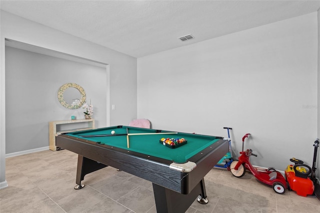 playroom featuring a textured ceiling, pool table, visible vents, and baseboards