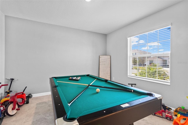 game room featuring billiards and baseboards