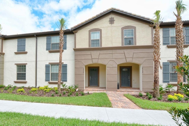 view of front of house with stucco siding