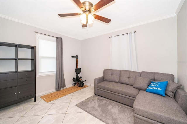 living room with light tile patterned floors, baseboards, ornamental molding, and a ceiling fan