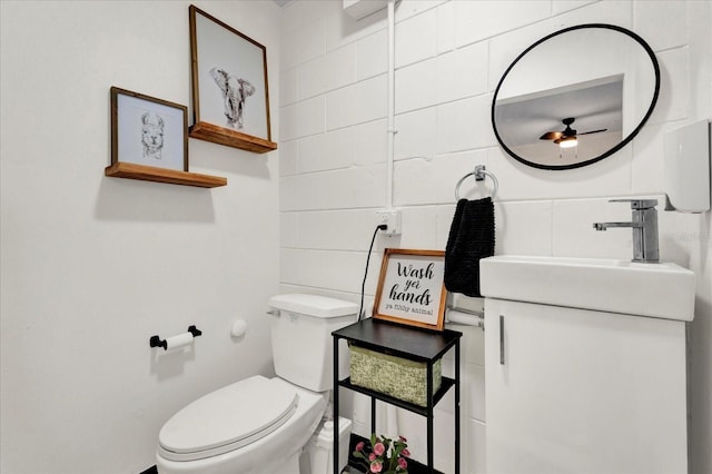 half bath with vanity and toilet