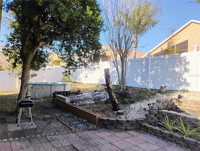 view of patio featuring a fenced backyard