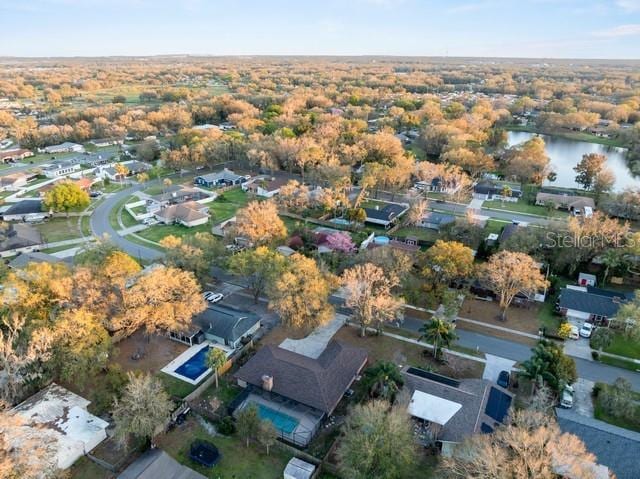 aerial view featuring a residential view and a water view