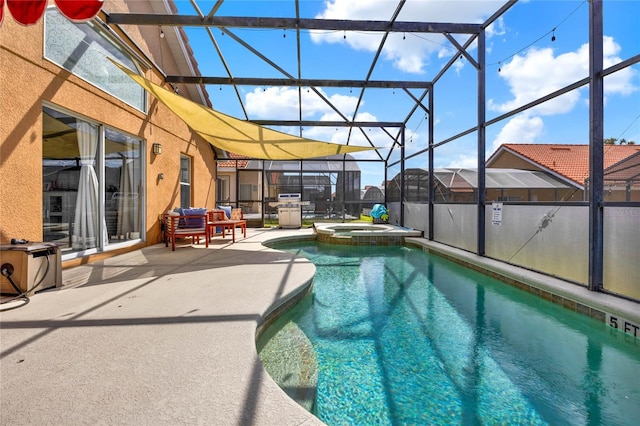 view of pool with a patio, area for grilling, a lanai, and a pool with connected hot tub