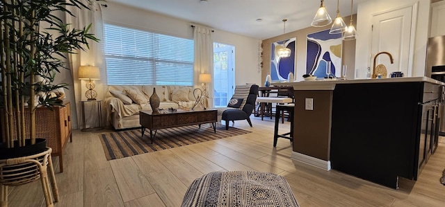 803 Longboat Dr, Davenport, FL 33896 - living area with light wood-style flooring