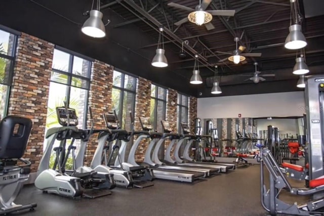 803 Longboat Dr, Davenport, FL 33896 - exercise room with a towering ceiling and a ceiling fan