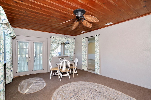 sunroom featuring wooden ceiling, visible vents, ceiling fan, and french doors