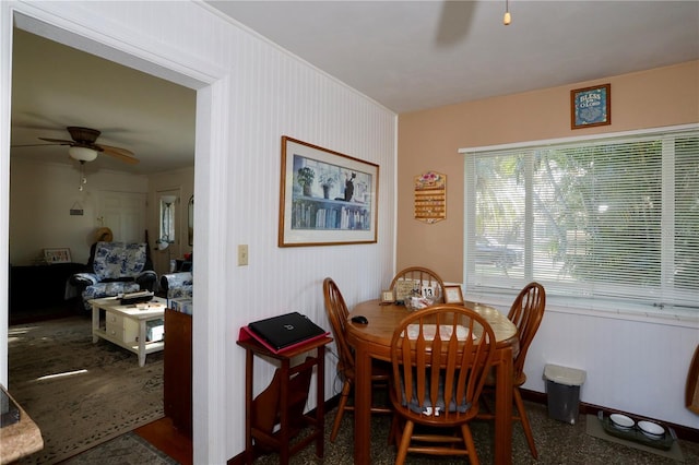 dining space featuring ceiling fan