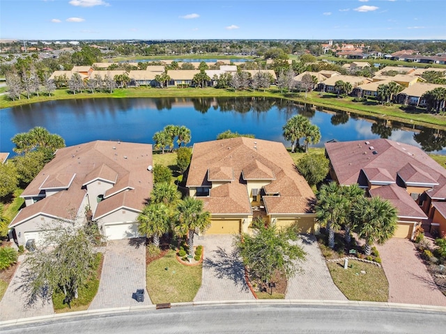 aerial view with a water view and a residential view