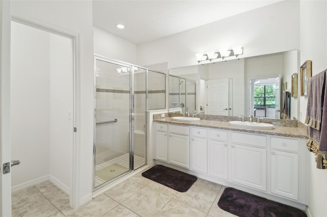 3390 Fallbrook Dr, Kissimmee, FL 34759 - full bathroom with a stall shower, a sink, and double vanity