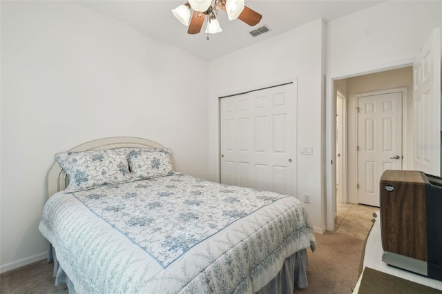 3390 Fallbrook Dr, Kissimmee, FL 34759 - carpeted bedroom featuring baseboards, ceiling fan, visible vents, and a closet