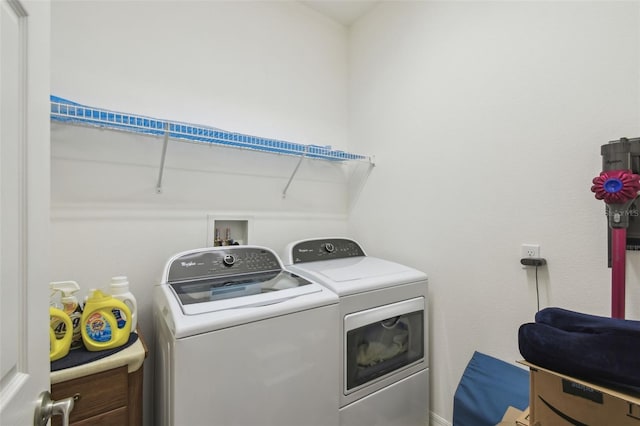 3390 Fallbrook Dr, Kissimmee, FL 34759 - washroom with washer and dryer and laundry area