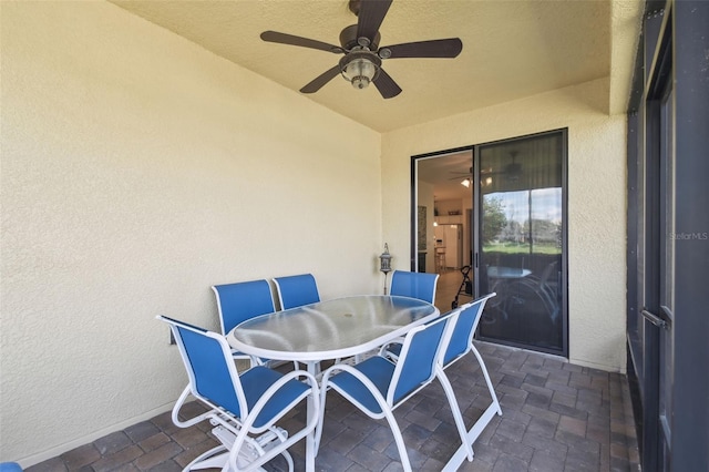 3390 Fallbrook Dr, Kissimmee, FL 34759 - view of patio with a ceiling fan and outdoor dining space