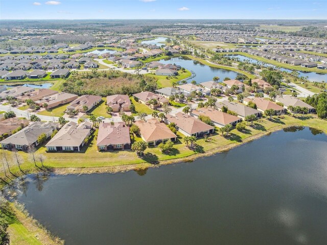 3390 Fallbrook Dr, Kissimmee, FL 34759 - drone / aerial view with a water view and a residential view