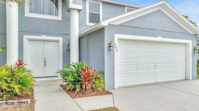 garage with driveway