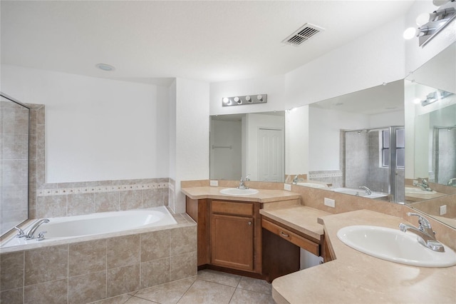 full bathroom featuring tile patterned floors, visible vents, a stall shower, vanity, and a bath