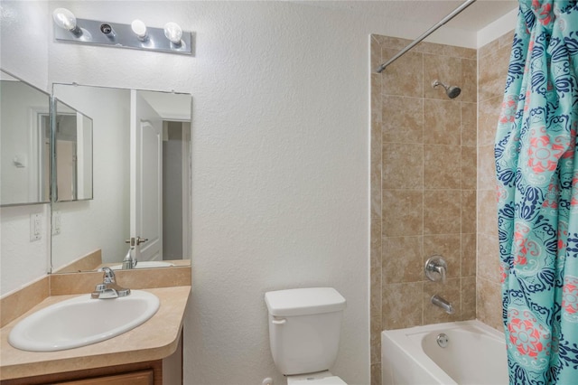 full bathroom featuring shower / bath combo, vanity, and toilet