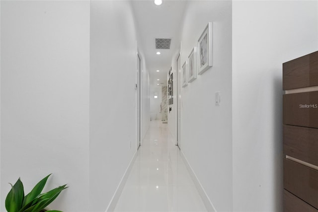 hall with visible vents and recessed lighting