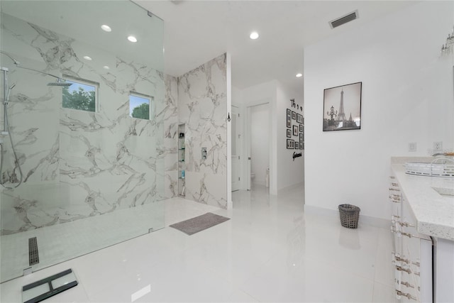 full bath with recessed lighting, visible vents, toilet, and a marble finish shower