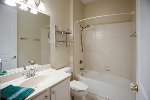 bathroom with vanity, tile patterned floors, toilet, and shower / bath combination