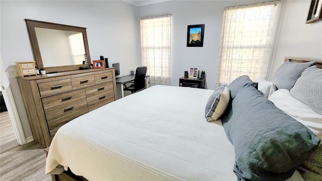 bedroom featuring light wood-type flooring