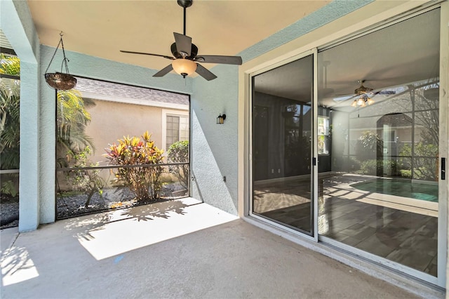 view of patio with a ceiling fan