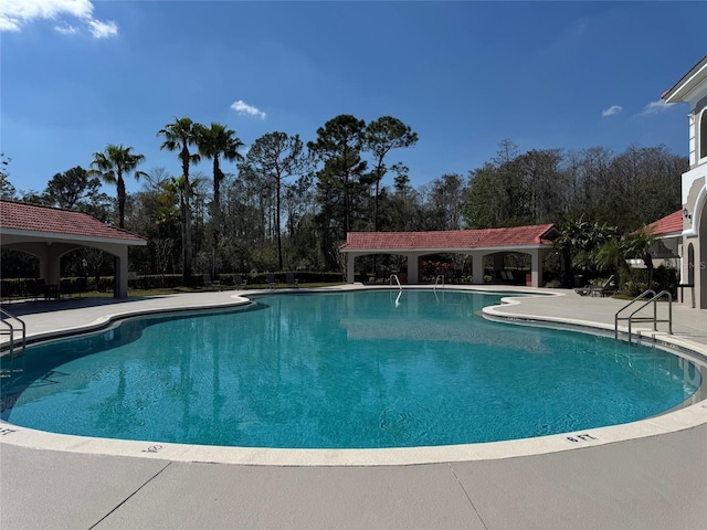 pool featuring a patio area